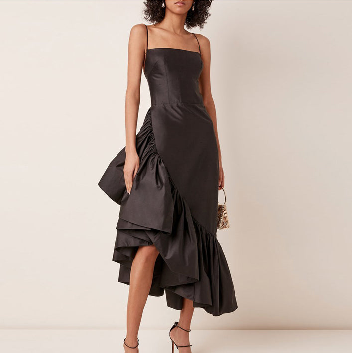 asymmetrical closing dress Asymmetrical dress featuring a crystal embellished bust and a cascading  cape