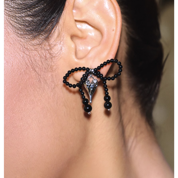 SEVKT Bow And Heart Earrings - Pair